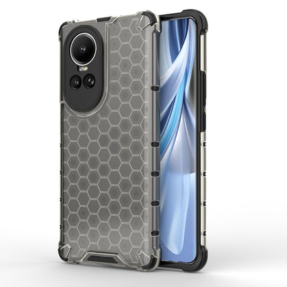 Honeycomb shockproof phone case in clear gray with black bumper, hex grip texture