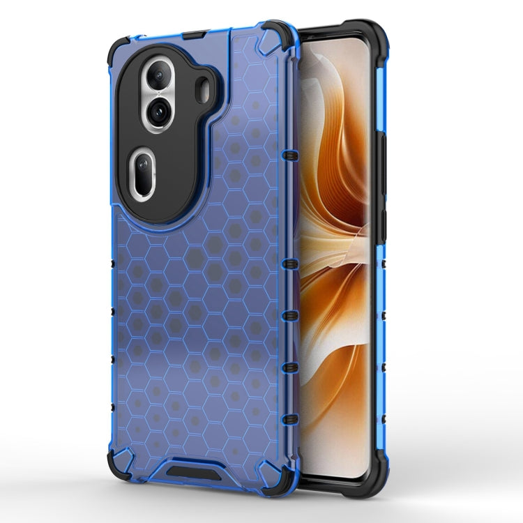 Honeycomb shockproof phone case in blue with black bumper, raised camera protection