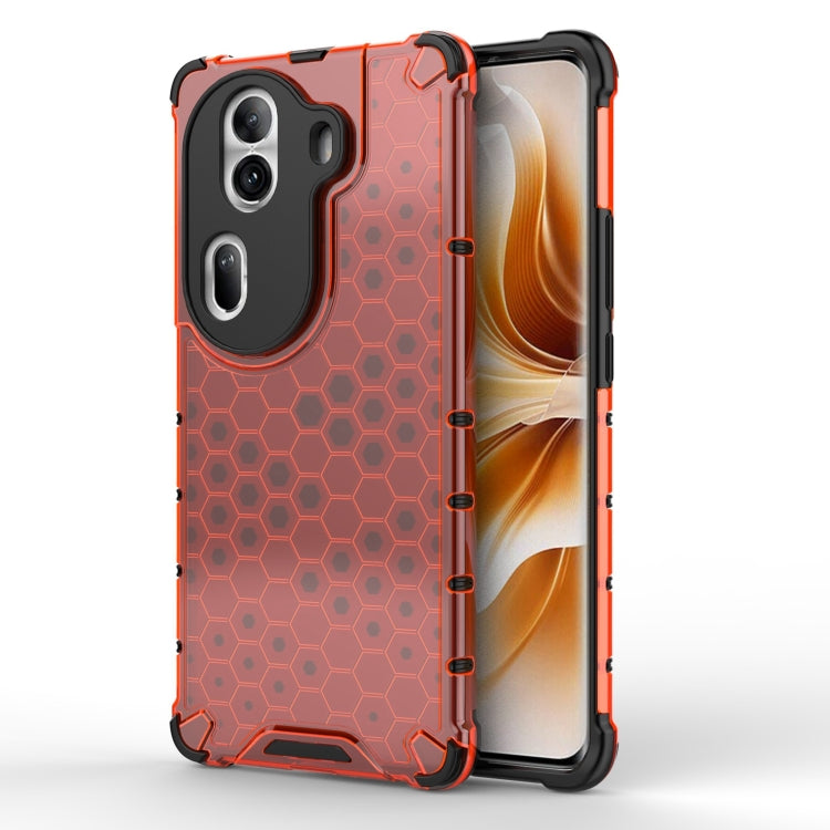 Honeycomb shockproof phone case in red with black bumper, raised camera protection