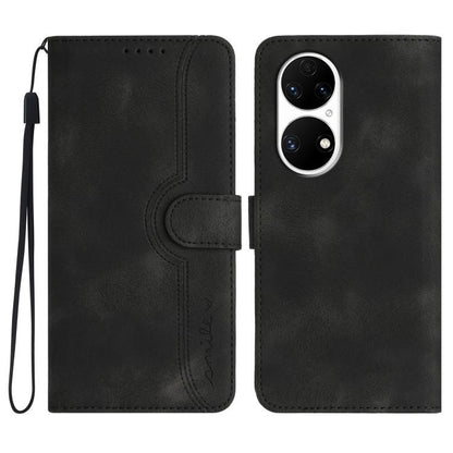 Black wallet-style leather phone case with heart-pattern cutout and wrist strap