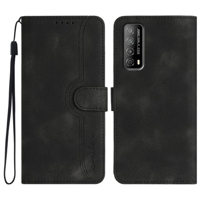 Black wallet-style leather phone case with heart-pattern cutout and wrist strap
