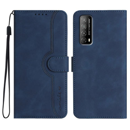 Dark blue wallet-style leather phone case with heart-pattern cutout and wrist strap
