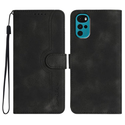 Black leather folio phone case with wrist strap and heart-shaped embossed panel
