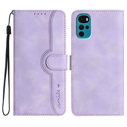 Purple leather folio phone case with wrist strap and heart-shaped embossed panel