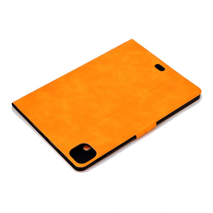 Orange leather flip case with bottom port cutout and slim fold edge
