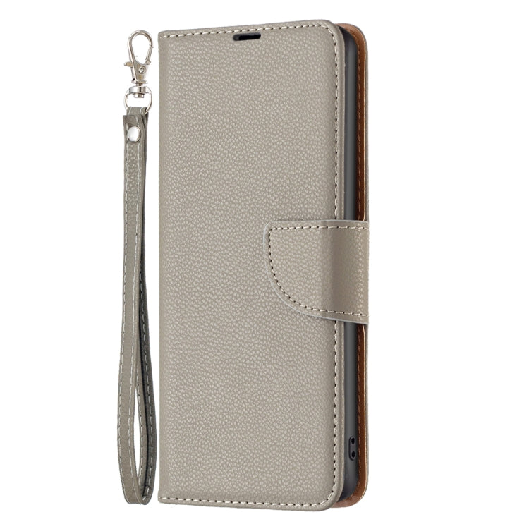 Grey textured flip leather phone case with wrist strap and magnetic closure