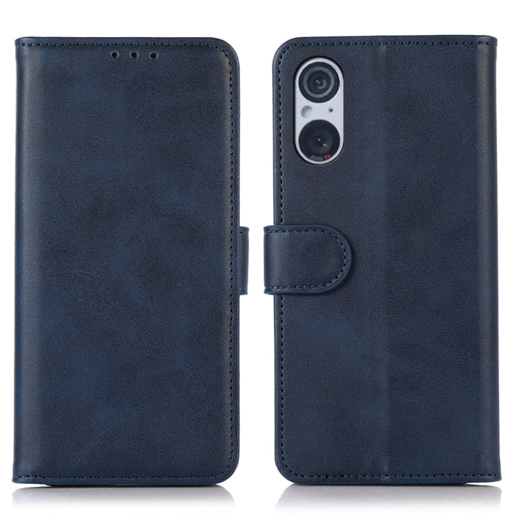 Blue folio leather phone case with camera cutout and snap tab, front and back