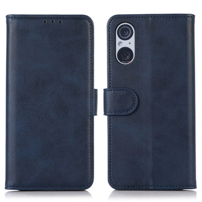 Blue folio leather phone case with camera cutout and snap tab, front and back