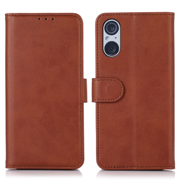 Brown folio leather phone case with camera cutout and snap tab, front and back