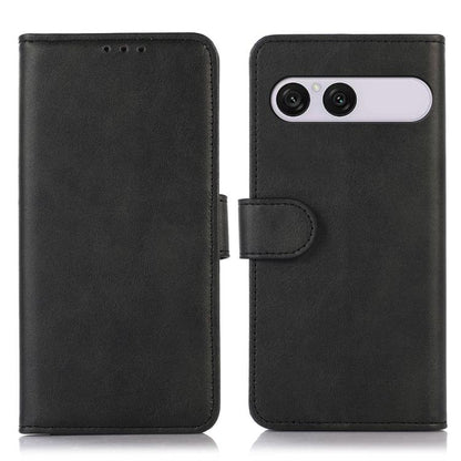 Black cow-texture leather phone case with folio flap and camera cutout.