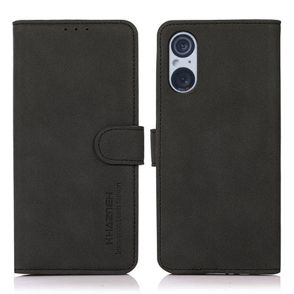 Matte black leather phone case with flip cover and side magnetic strap, back camera openings