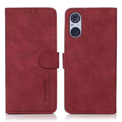 Red matte leather flip phone case with side strap and camera cutout