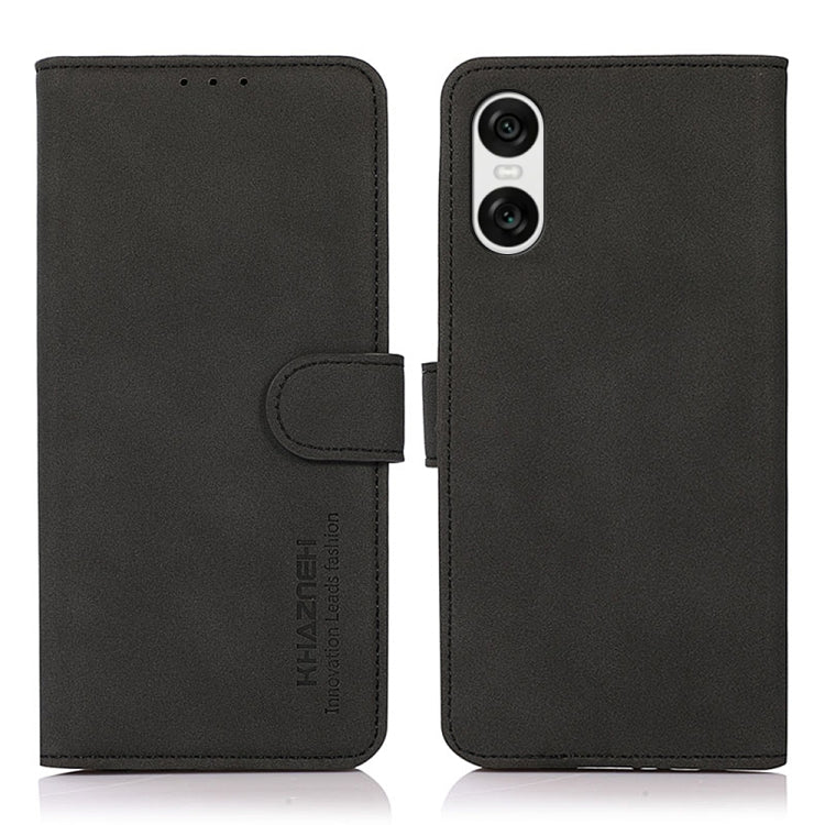 Matte black leather phone case with flip cover and side magnetic strap, rear camera cutout