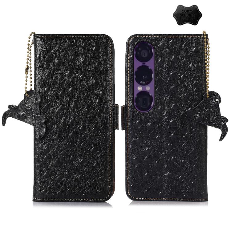 Black ostrich leather phone wallet case with animal charm and beaded side strap