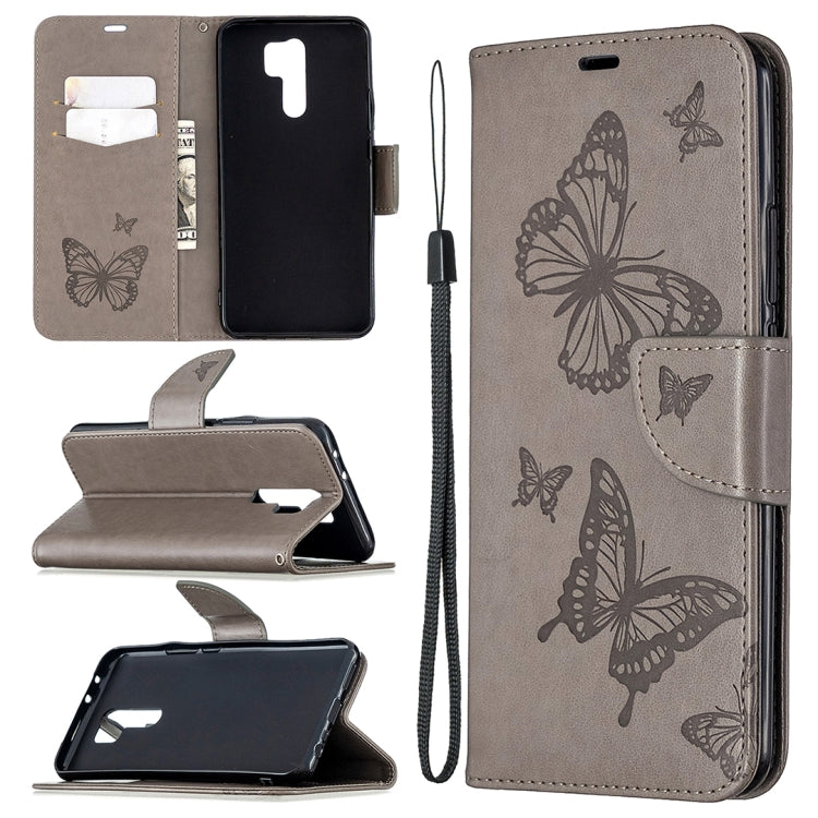 Taupe leather flip phone wallet case with embossed butterflies and lanyard strap
