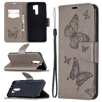 Taupe leather flip phone wallet case with embossed butterflies and lanyard strap