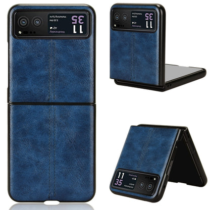 Textured leather-style flip phone case with stand, blue, stitched panel design