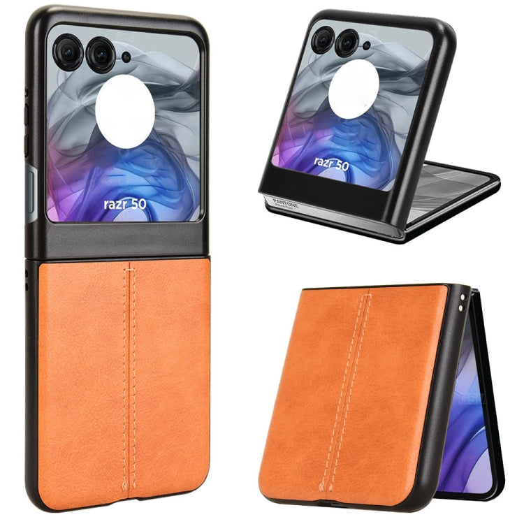 Textured leather-style flip phone case with stand, orange and black, stitched panel