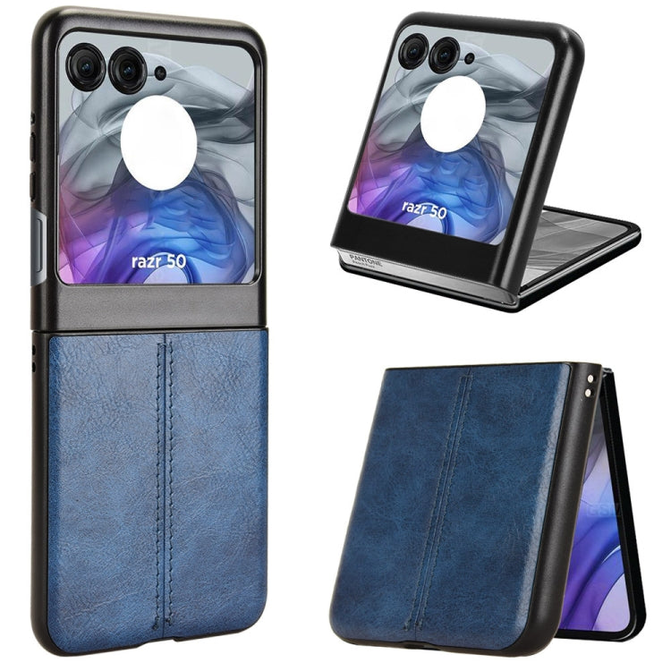 Textured leather-style flip phone case with stand, blue and black, stitched panel