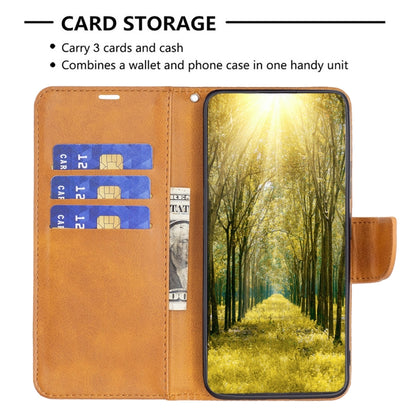 Tan flip leather phone case with card slots and window display cutout