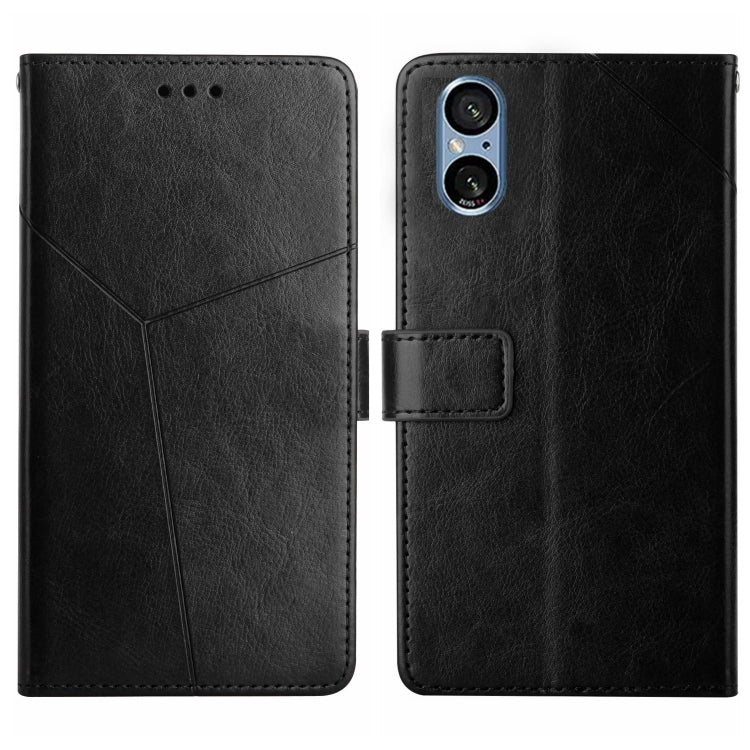 Black Y-pattern flip leather phone case with card slot and camera cutout