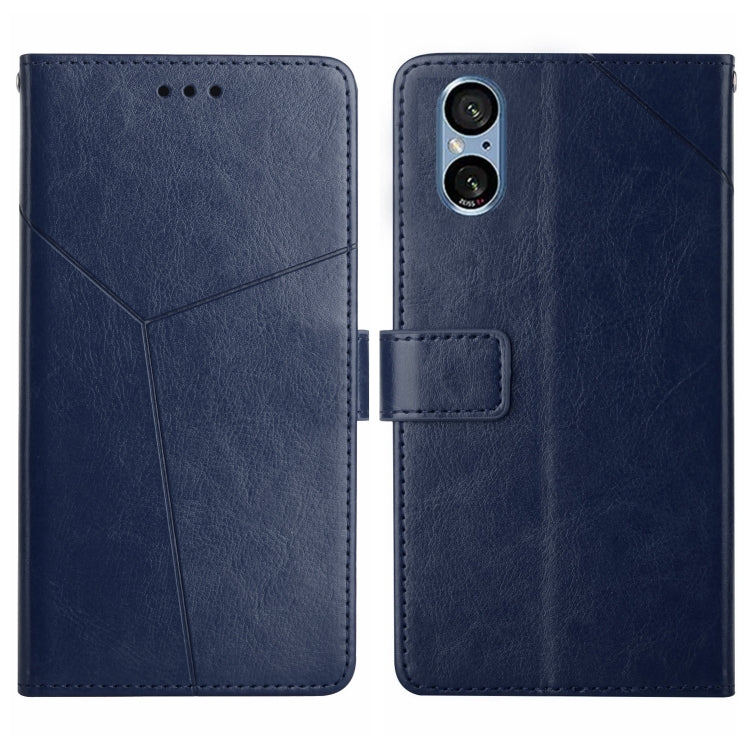 Blue Y-pattern flip leather phone case with card slot and camera cutout