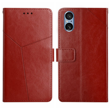 Brown Y-pattern flip leather phone case with card slot and camera cutout
