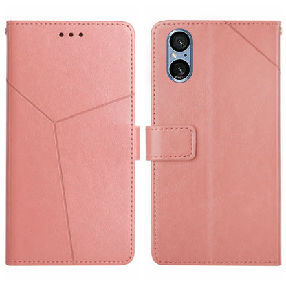 Light pink Y-pattern flip leather phone case with card slot and camera cutout