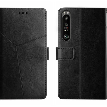 Y-pattern flip leather phone case in black, with camera cutout and card holder