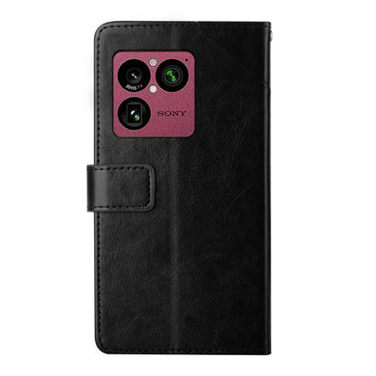 Black Y-pattern flip phone case with camera cutout and front card holder.