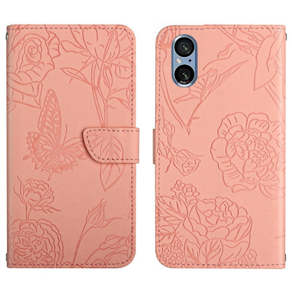 Blush pink butterfly embossed flip leather phone case with folding flap and floral pattern