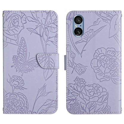 Lilac butterfly embossed flip leather phone case with side folding flap and floral pattern