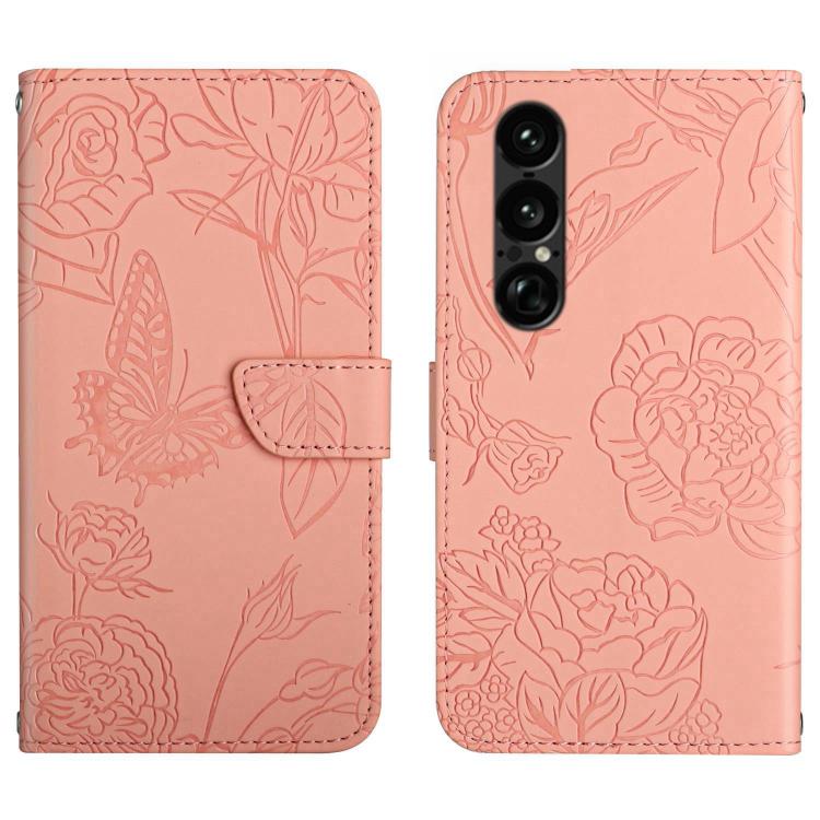 Pink flip leather phone case with embossed butterfly-and-flower pattern and camera cutout
