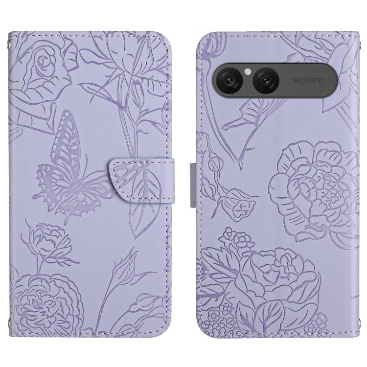 Purple flip leather phone case with embossed butterfly-and-flower pattern and camera cutout