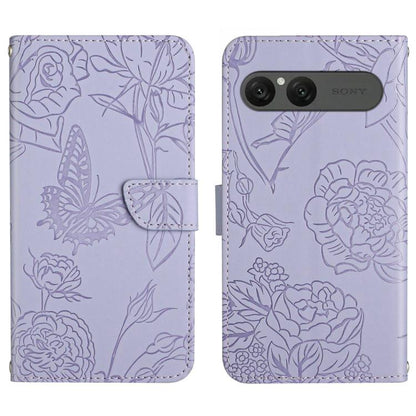 Purple flip leather phone case with embossed butterfly-and-flower pattern and camera cutout