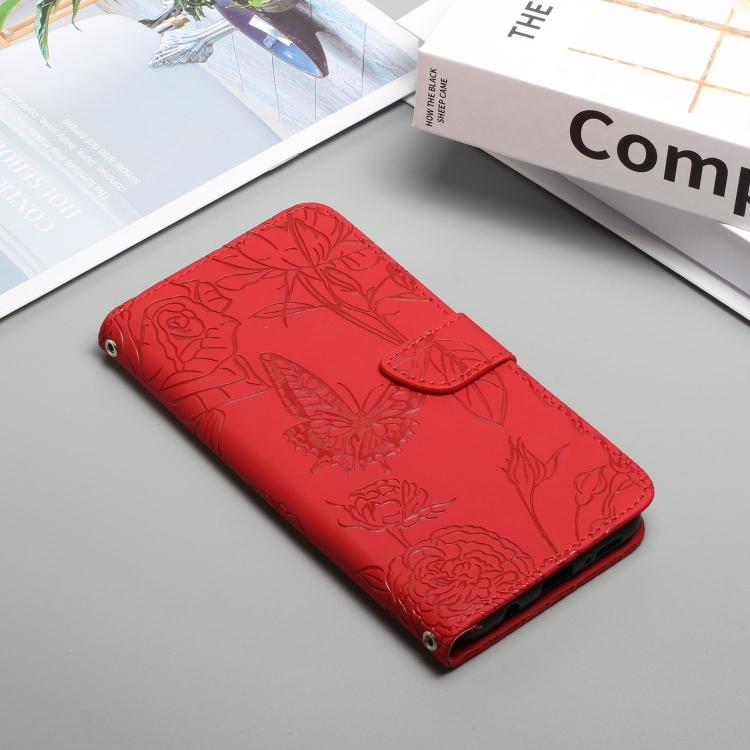 Red butterfly-embossed leather flip phone case with magnetic clasp, angled view