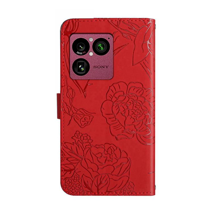 Red butterfly-embossed leather flip phone case with camera cutout, back view