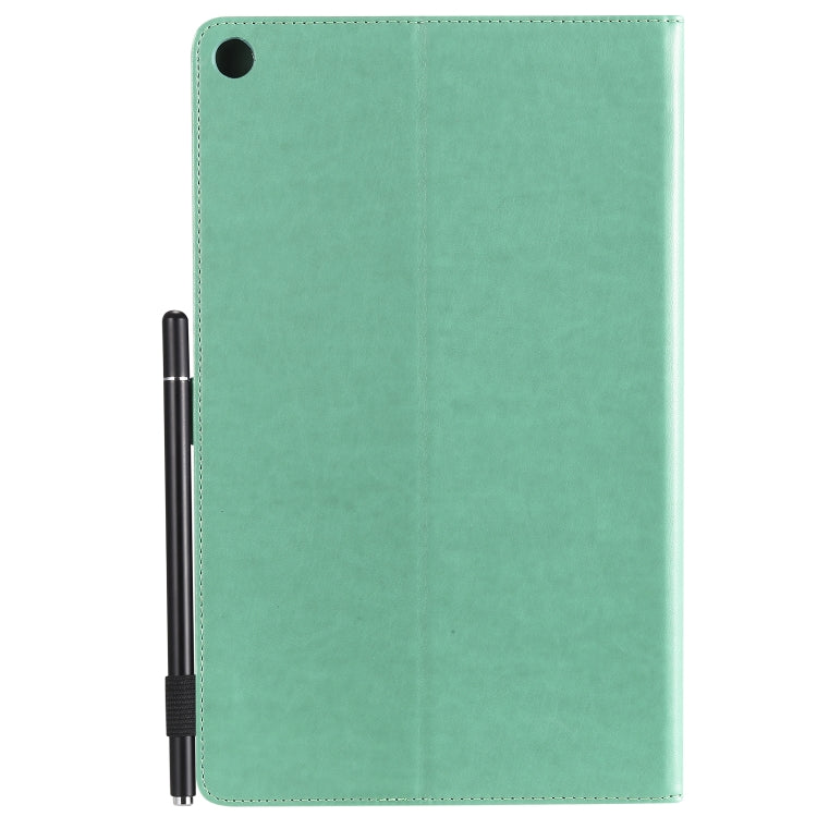 Green folio tablet case back with corner stitching and camera cutout