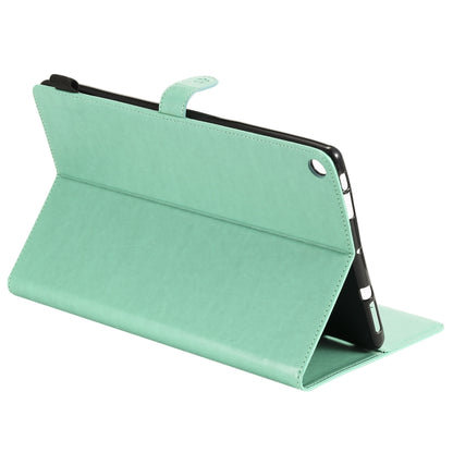 Green flip stand tablet case with angled viewing support and secure top strap