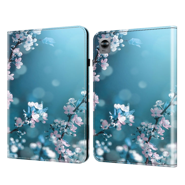 Tablet case with blue background and pastel blossoms print, hinged cover