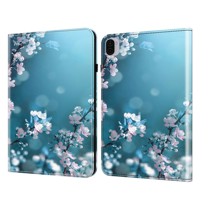 Tablet case with blue floral blossoms and light bokeh print, hinged cover