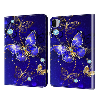 Blue painted leather tablet case with gold butterfly pattern and gem accents