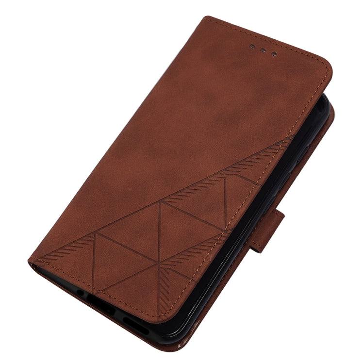 Brown leather flip phone case with embossed geometric detailing on the front cover