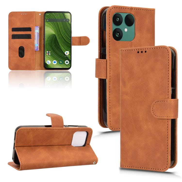 Brown magnetic flip leather phone case with side card slot and front flap