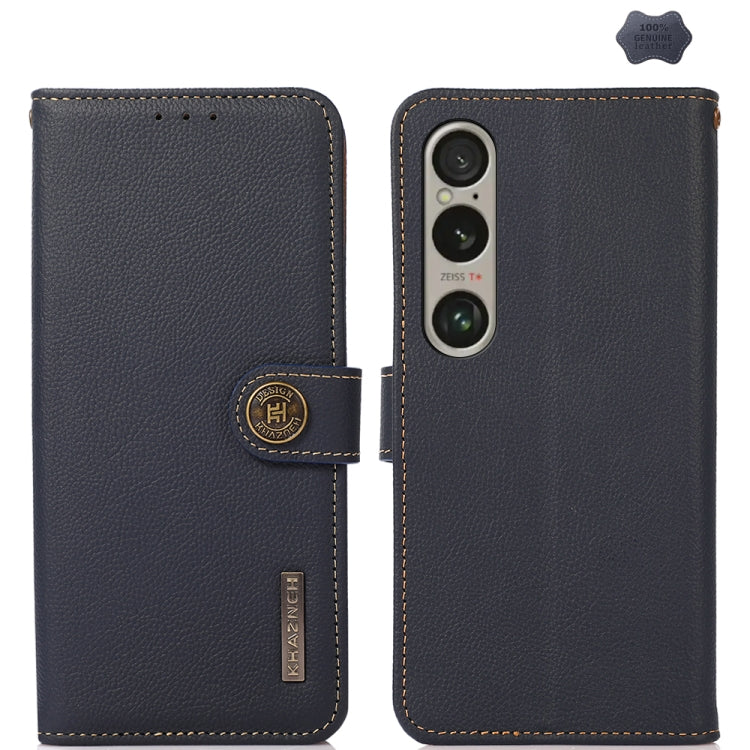 Blue genuine leather phone case with flip cover, camera cutout, and branded leather tab