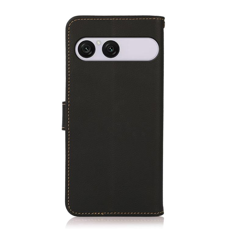 Black genuine leather RFID phone case with cutout for dual camera and soft lining.