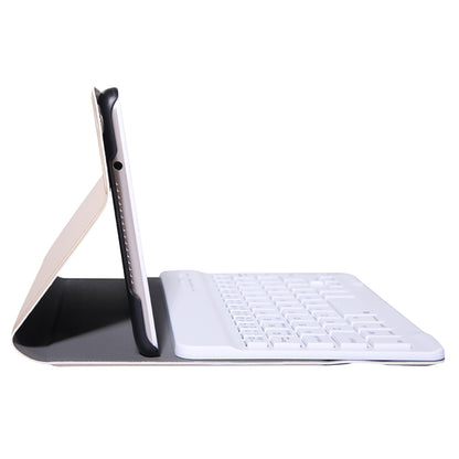 Gold folio case with keyboard docked and tablet propped on side stand