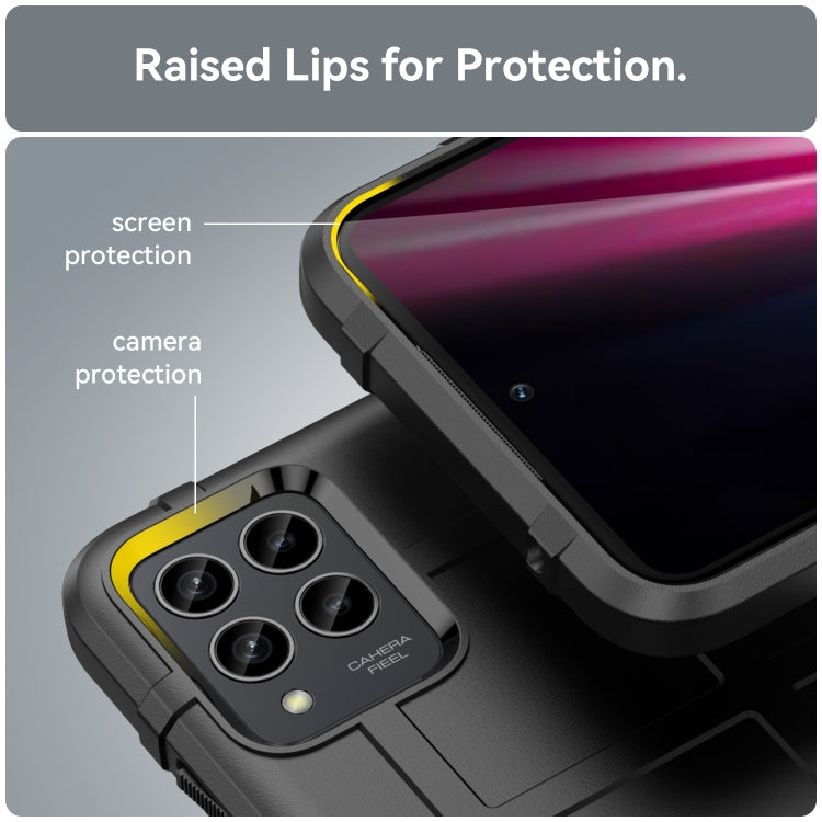 Black rugged phone case with raised lips for screen and camera protection.