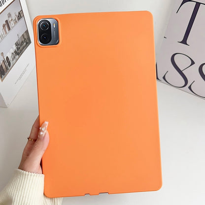 Orange tablet case with camera cutout and slim protective edges.