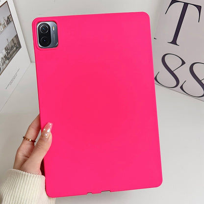 Hot pink tablet case with camera cutout and slim protective edges.